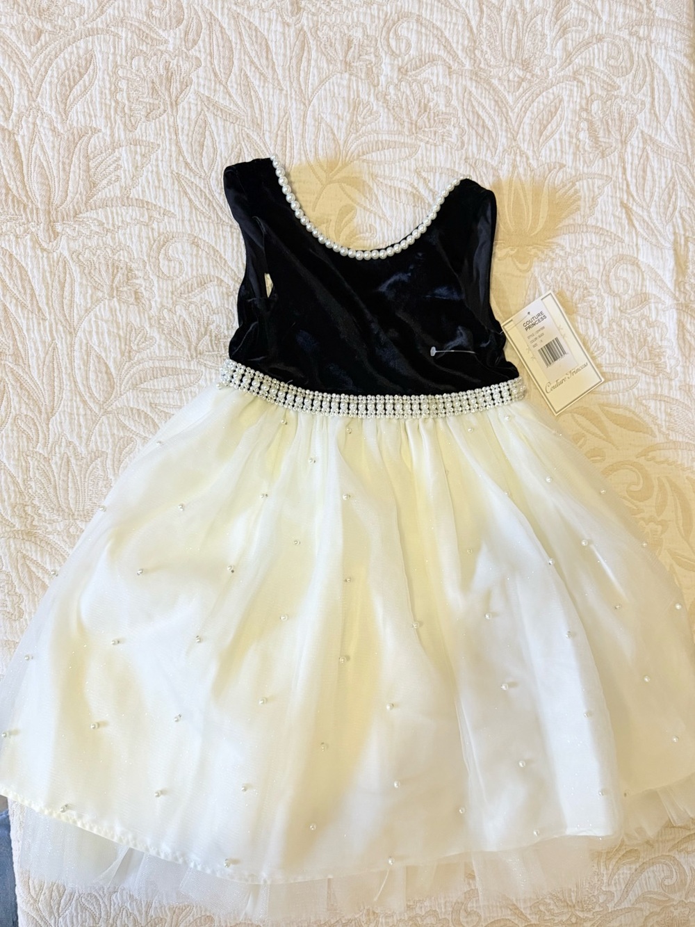 Elegant Black and White Pearl-Trim Girls' Dress with Bow